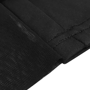 Detail of black mesh and elastic fabric with reinforced stitching on jumpsuit