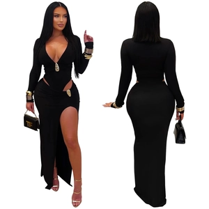 Detail view of black V-neck mini dress with waist cut-outs and golden metal buckles