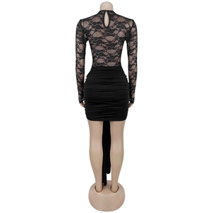 Back view of bodycon black dress featuring lace sleeves and a ruched skirt detail