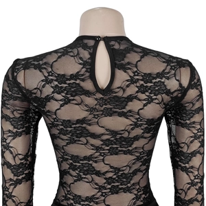 Detail view of black floral lace dress back with teardrop cutout and button closure