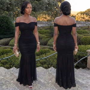 Front and back detail of black off-shoulder mermaid evening dress with mesh ruffles