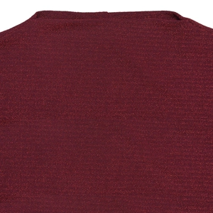 Detailed view of dark red knitted fabric with metallic shimmer on dress neckline