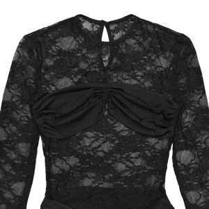 Detail of black long-sleeve lace bodysuit featuring sheer floral patterns and ruched texture