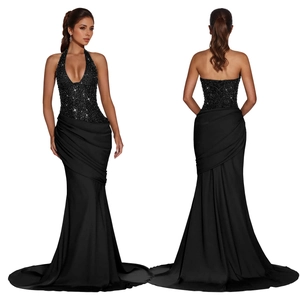 Detail view of black sequined halter neck dress with backless fishtail silhouette