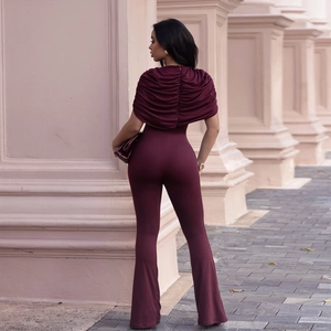 Detailed back view of an elegant burgundy slim-fit jumpsuit with a pleated cape design