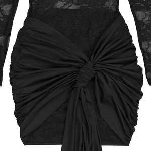 Detailed view of the ruched black lace bodice and central knot design on the dress