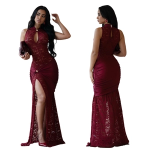Detailed lace texture and waist pleats on this burgundy bodycon evening dress