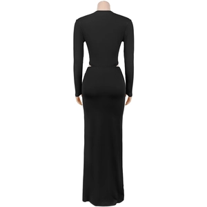 Detail of black long sleeve bodycon dress showing stylish waist cut-outs and floor length