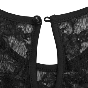 Close-up of black lace dress back collar with keyhole cutout and small button detail