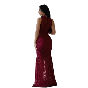 Detail view of burgundy lace mermaid dress featuring pleated back and hollow-out design
