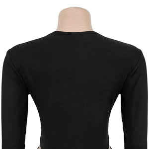 Rear view of a tight-fitting black long-sleeved bodysuit with a round neckline