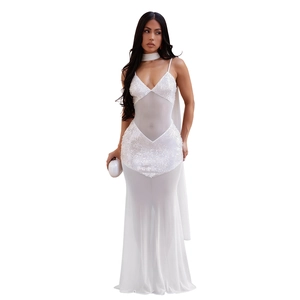 Detail of white sequin bodice and sheer mesh skirt on a floor-length evening gown