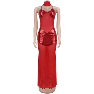 Detail of red sequin stitching and sheer mesh fabric on a sexy V-neck evening gown