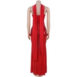 Detail view of red sequin evening dress featuring mesh fabric and long back tassels