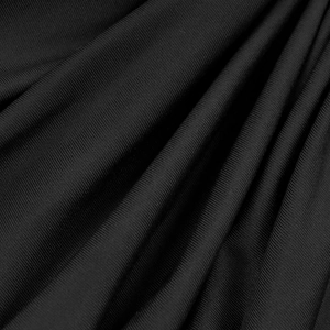 Detailed macro shot of black ribbed knit fabric texture with high elasticity and soft drape