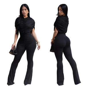 Front and back views of a black slim fit ruched jumpsuit with high waist flare pants