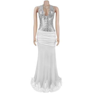 Detail of elegant sequined halter top and white draped evening dress texture
