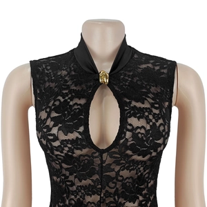 Close-up of black floral lace dress with keyhole cutout and gold metal buckle detail
