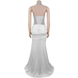 Detail of sequined back bodice with criss-cross halter straps on a white fishtail dress