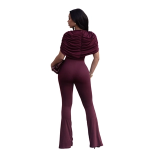 Elegant deep red jumpsuit with unique cape design and slim fit wide leg pants back view