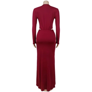 Rear view of a burgundy long-sleeve bodycon maxi dress with side cut-out details