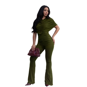 Detail of elegant olive green ruched jumpsuit with high waist and flared leg cut