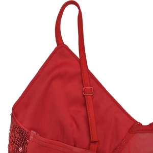 Detail view of red sequin dress with adjustable spaghetti strap and mesh lining