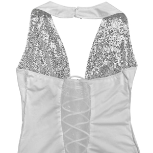 Detail of white halter neck dress featuring silver sequins and mesh lace-up design