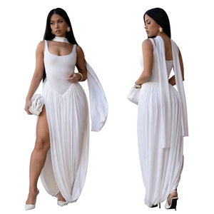 Detailed view of white sleeveless maxi dress featuring high slit and matching neck scarf