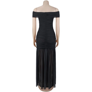 Detail of ruched black mesh dress back with hidden zipper and sheer bodycon hemline