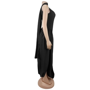 Detail view of black halter neck dress featuring elegant back streamer and side drape design