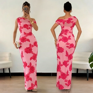 Detail of pink one-shoulder mermaid dress featuring 3D floral embroidery and elegant texture