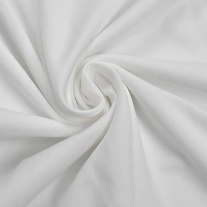 Detailed macro view of white breathable knit fabric showing soft texture and fine mesh