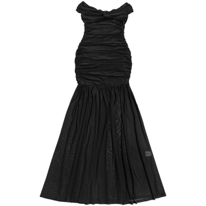 Detail of elegant black mesh tube dress showing the ruching texture and sheer fishtail hem