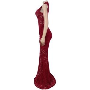 Detail view of red lace maxi dress featuring high neck design and mermaid hemline