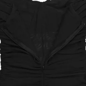 Detail of ruched black mesh fabric featuring a high-quality invisible zipper closure