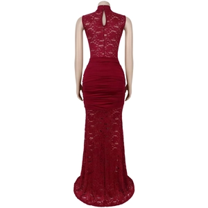 Detail of burgundy lace dress showing back keyhole closure and ruched mermaid silhouette