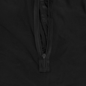 Detail of high-quality black mesh fabric featuring a matching seamless hidden zipper closure