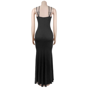 Detail view of the elegant black evening dress with rhinestones and fishtail silhouette