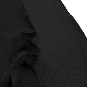 Detail view of the fine stitching and high-quality black knitted fabric of this dress set