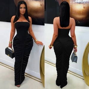 Close-up of black strapless bodycon dress featuring elegant side and center ruching details