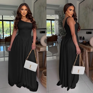 Detail view of black one-shoulder maxi dress with elegant pleats and open back design