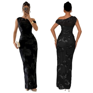 Detail of elegant black mesh one-shoulder dress with 3D floral textures and bodycon fit