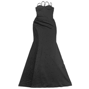 Close-up of black evening gown featuring elegant sequins and asymmetric ruffled details