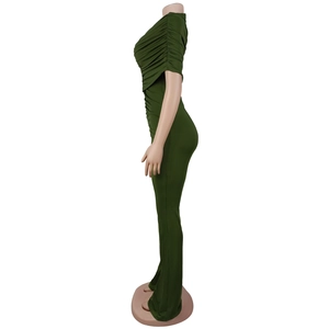 Detail of elegant dark green wide-leg jumpsuit with Ruched draped shoulder design