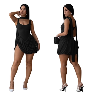 Detail of black slim fit sleeveless mini dress set with draped skirt and matching scarf
