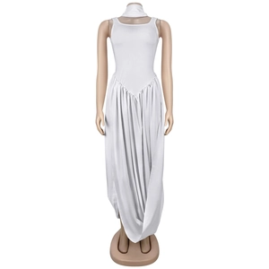 Detail of white sleeveless dress featuring a high waistline and elegant side split drape