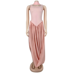 Pink sleeveless maxi dress detail with matching neck strap and elegant draping