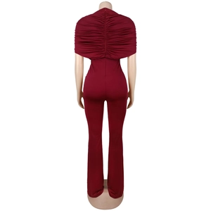 Detail view of the elegant ruched back and invisible zipper on this wine red jumpsuit
