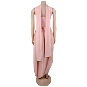 Detail view of pink sleeveless backless dress featuring elegant long vertical ribbons